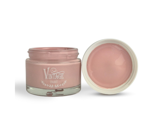 Vintage Paint Kreidefarbe - Dusty Rose
 
Vintage Paint "Dusty Rose" ist eine natürliche, umweltfreundliche Farbe auf Wasserbasis die speziell entwickelt wurde um Deinem Kunstwerk die authentisch matte und kreidige Oberfläche zu verleihen, für die zb. alte oder antike Möbel bekannt sind. Die Farbe haftet ohne besondere Vorbereitung auf fast jeder Oberfläche (Ton, Metall, Glas, Keramik, Holz, Kunststoff, Stoff, Textilien etc.) und bietet eine gute Deckkraft. Sie passt perfekt und harmoniert mit dem Französisch Nordic Landhausstil.

Du kannst sie auf Möbeln, Gebrauchsgegenständen, Wänden, Böden, Fliesen etc. verwenden, um Deinen Lieblingsstil oder auch verschiedene dekorative Effekte zu kreieren. Die Kreidefarbe ist beinahe geruchlos und trocknet sehr schnell. Das spezielle Bindemittel macht den Lack flexibel, sehr lange haltbar und eignet sich daher auch gut für Fussböden und Treppen. Das Schleifen ist normalerweise nicht erforderlich, solange die Oberfläche sauber ist und sich die älteren Farbschichten nicht ablösen. Sie können deckend oder auch mit wasser verdünnt verarbeitet werden, so kannst Du lasierende, schimmernde Vintage Effekte erzielen.

Natural Vintage Paint lässt sich äusserst komfortabel verarbeiten und kann drinnen und auch draussen verwendet werden. Vintage Paint Kreidefarben sind nach dem durchtrocknen Wasserbeständig. Wir empfehlen zum Schutz und zur besseren Reinigung dennoch die Flächen durch Antique Wax, den Primer & Sealer oder bei besonders beanspruchten Flächen wie Fussböden den Ultra Matt Vanish als Versiegelung zu verwenden.